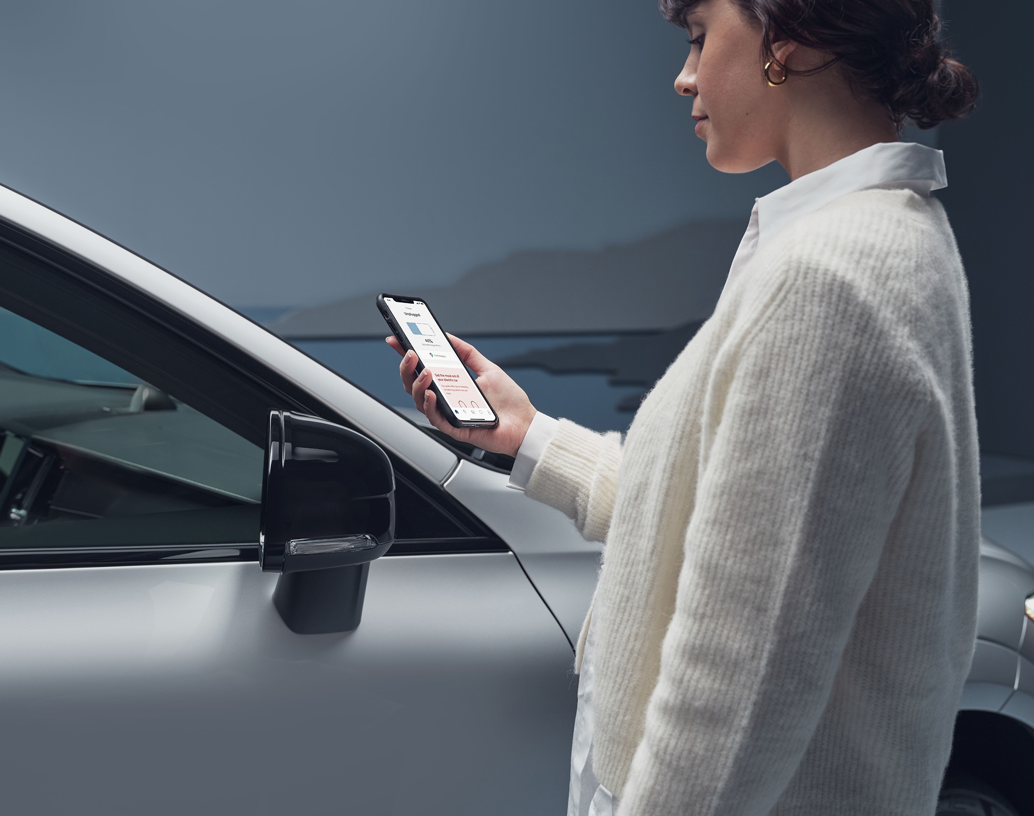 Volvo's book a service app open on a cellphone