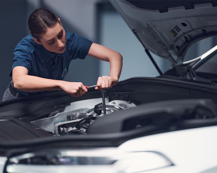 Classic Oil Service Plan technician performing and oil change